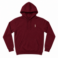 A maroon pullover hoodie with a small gold embroidered figure on the left chest, displayed on a clean white background.